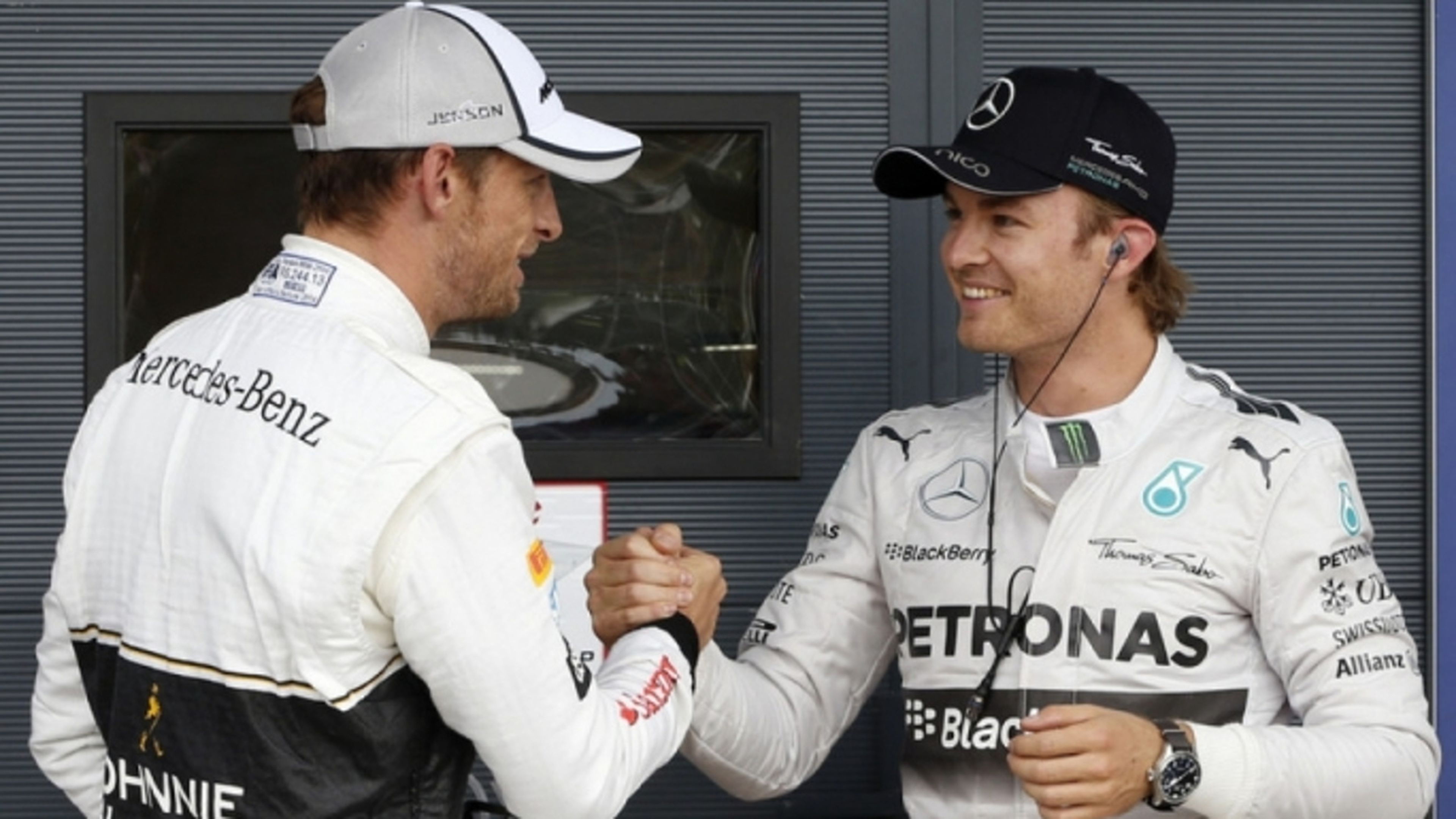Nico Rosberg y Jenson Button, dos de los tres campeones del mundo que más carreras han necesitado para serlo