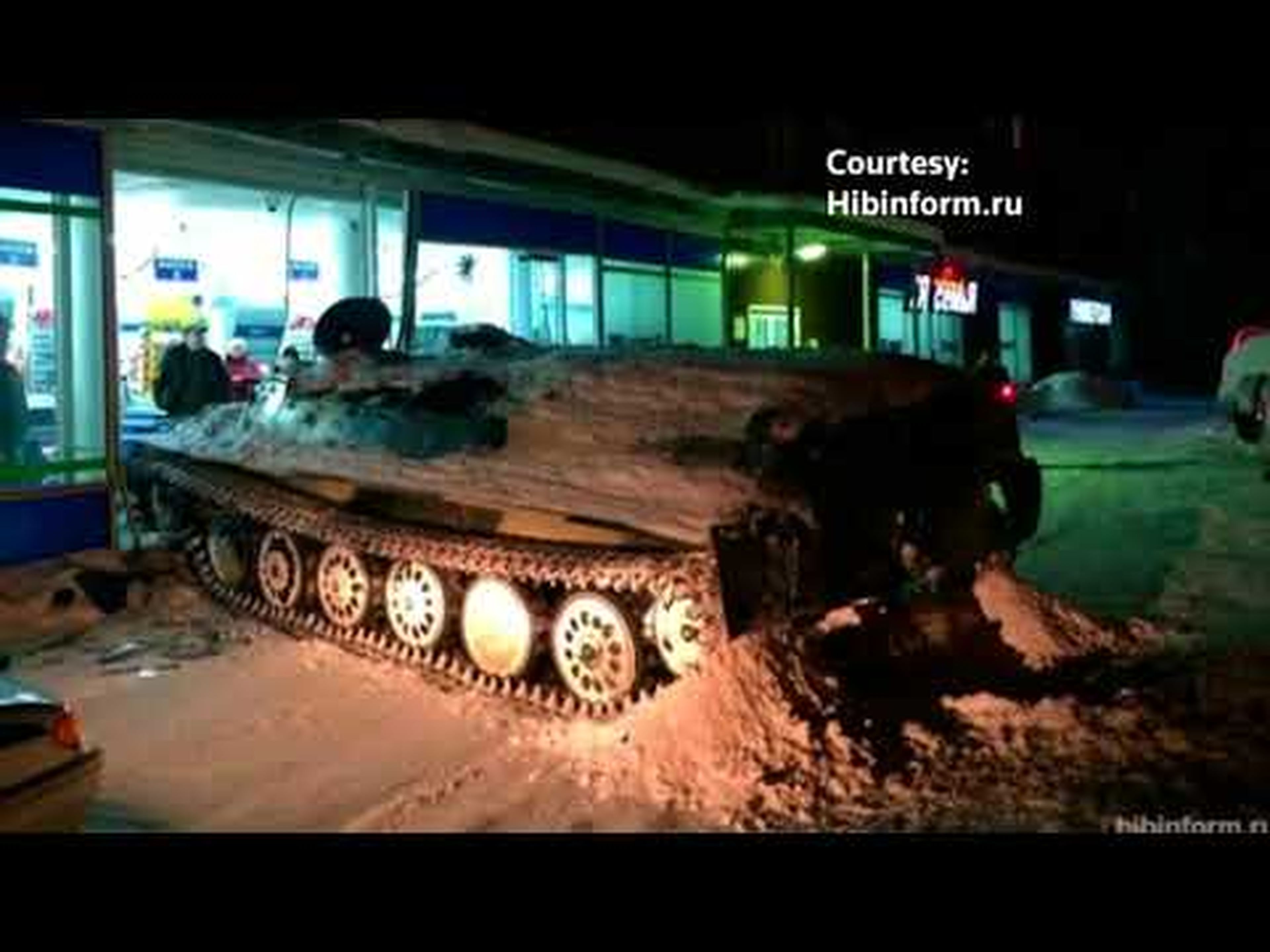 Drunk Russian Man Rams Armored Personnel Carrier into Shop, Steals Wine [Caught on Cam]