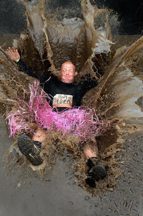 A competitor in Scotland's Tough Mudder race also made a splash. A competitor in Scotland's Tough Mudder race also made a splash.
