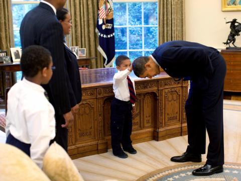 Former White House photographer and author of "Obama: An Intimate Portrait" Pete Souza captured this iconic shot of a young African-American boy seeing himself in the first black president. Former White House photographer and author of "Obama: An Intimate Portrait" Pete Souza captured this iconic shot of a young African-American boy seeing himself in the first black president.
