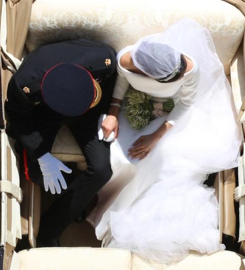 People thought this perfectly-timed shot of Prince Harry and Meghan Markle on their wedding day was taken by a drone, but it was photographer Yui Mok. People thought this perfectly-timed shot of Prince Harry and Meghan Markle on their wedding day was taken by a drone, but it was photographer Yui Mok.