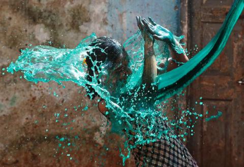 This photographer got the timing just right to capture celebrations of Holi, the Festival of Colors, in India. This photographer got the timing just right to capture celebrations of Holi, the Festival of Colors, in India.